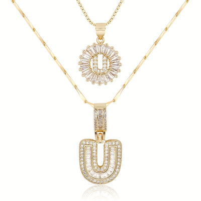 Pair of 14k Gold Initial Necklaces Adorned with Diamonds