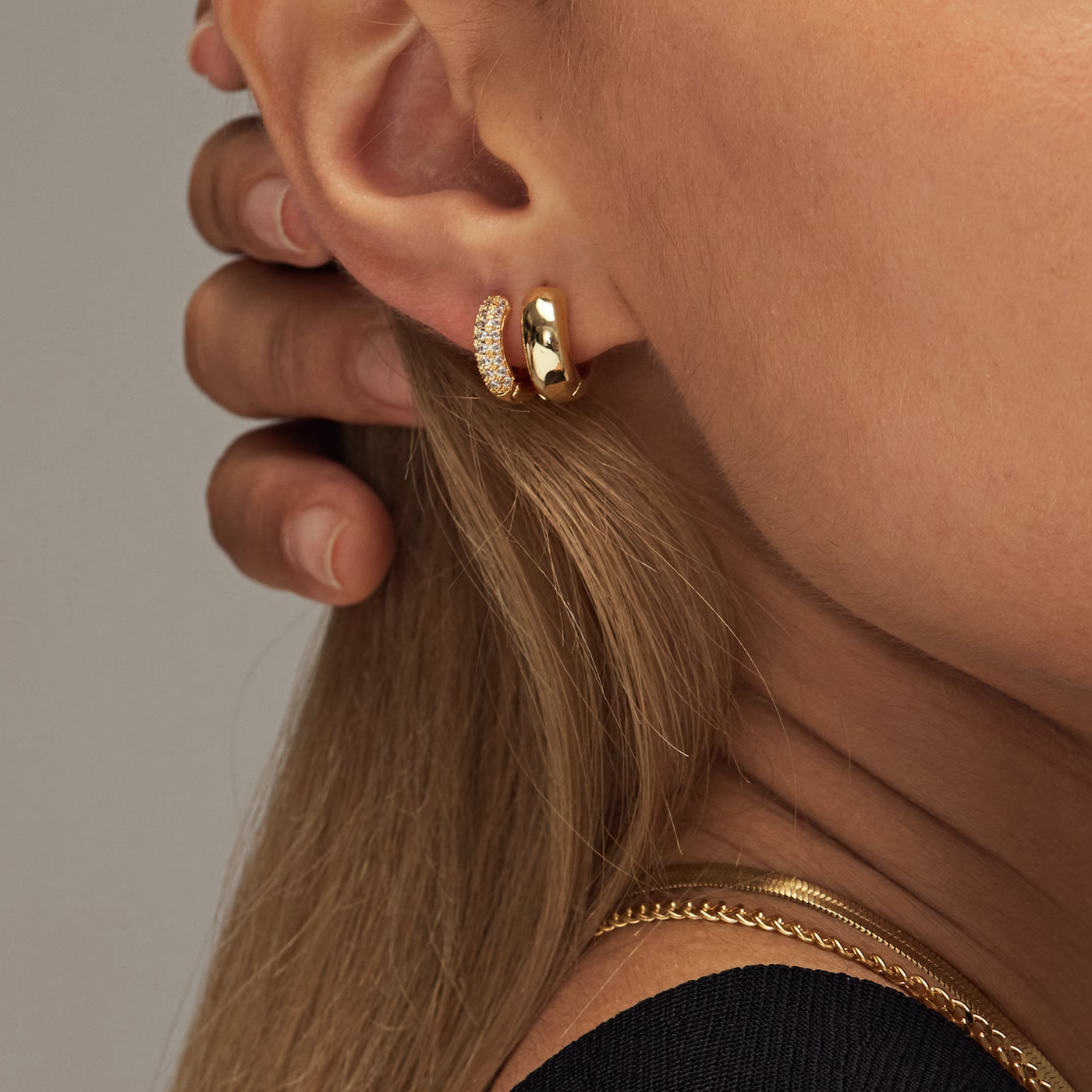 Explore the Distinctive Amy Huggie Earrings in 18k Gold