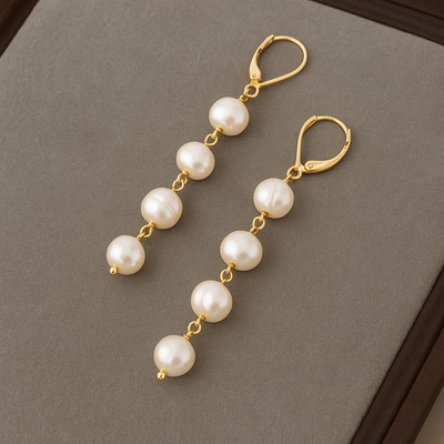 Pearl-Embellished Shell Pendant Earrings
