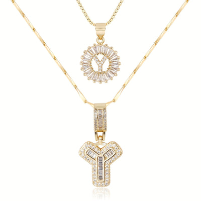 Pair of 14k Gold Initial Necklaces Adorned with Diamonds