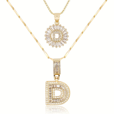 Pair of 14k Gold Initial Necklaces Adorned with Diamonds