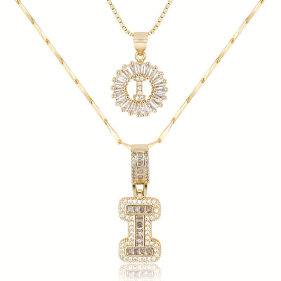 Pair of 14k Gold Initial Necklaces Adorned with Diamonds