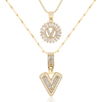 Pair of 14k Gold Initial Necklaces Adorned with Diamonds