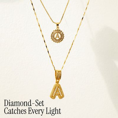 Pair of 14k Gold Initial Necklaces Adorned with Diamonds