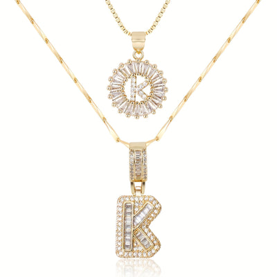 Pair of 14k Gold Initial Necklaces Adorned with Diamonds