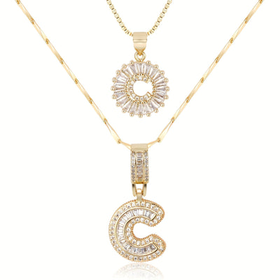 Pair of 14k Gold Initial Necklaces Adorned with Diamonds