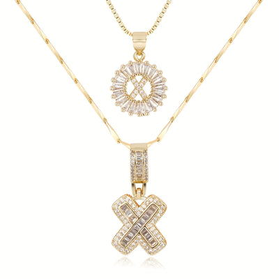 Pair of 14k Gold Initial Necklaces Adorned with Diamonds