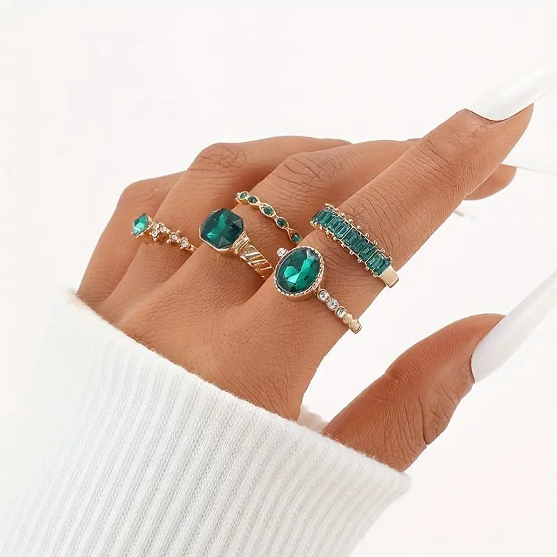 Zarina Elegant Emerald and Gold Ring Collection