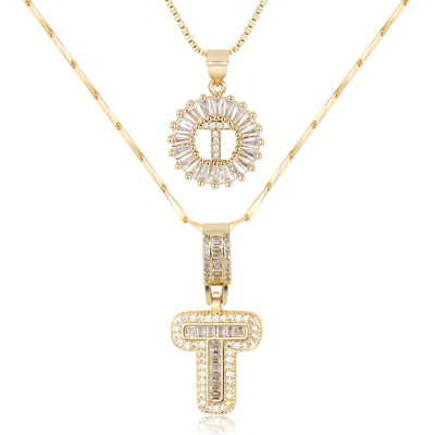 Pair of 14k Gold Initial Necklaces Adorned with Diamonds