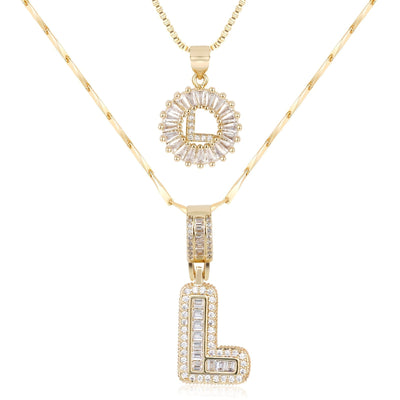 Pair of 14k Gold Initial Necklaces Adorned with Diamonds
