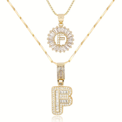 Pair of 14k Gold Initial Necklaces Adorned with Diamonds