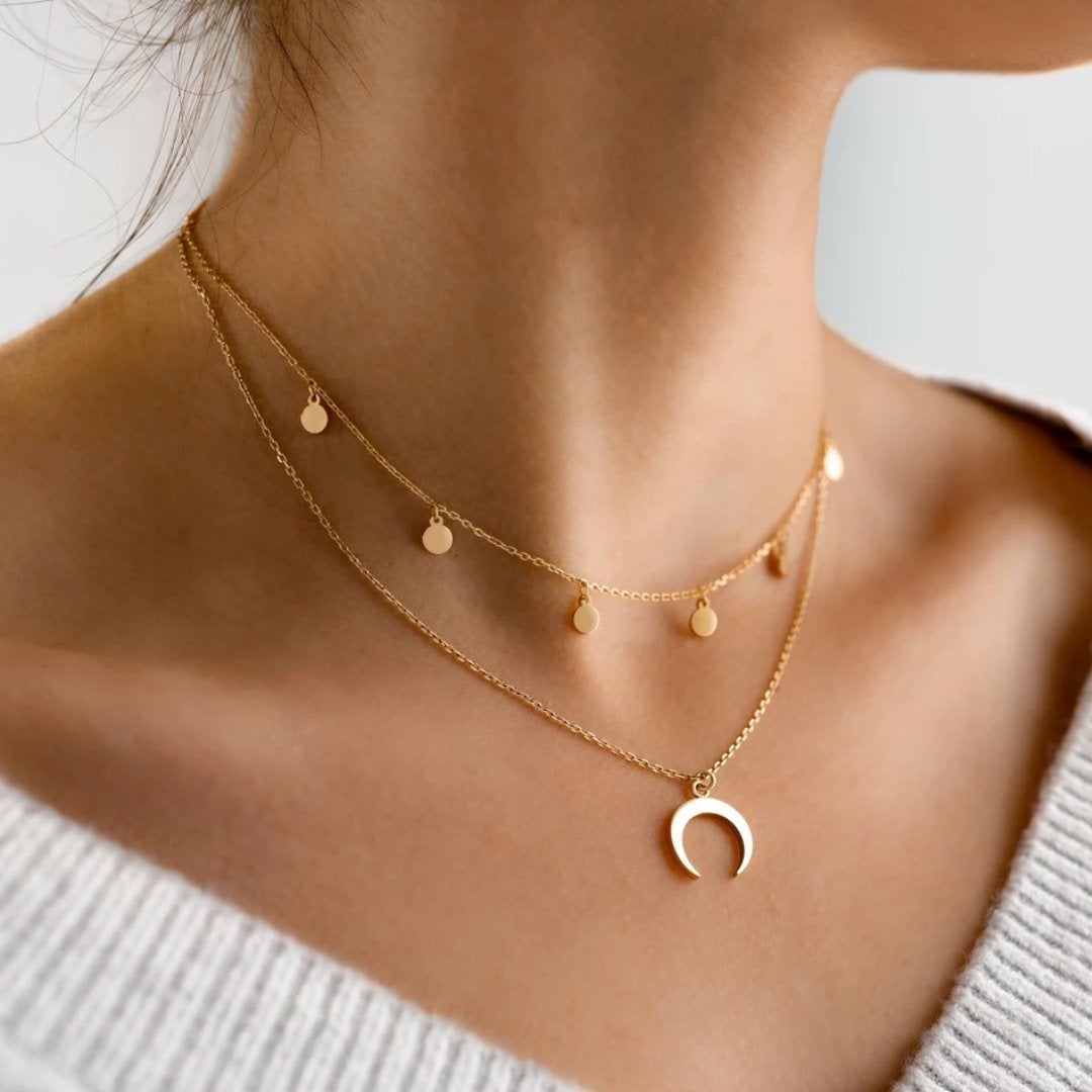 Elegant Gold Necklace Featuring a Delicate Moon Design