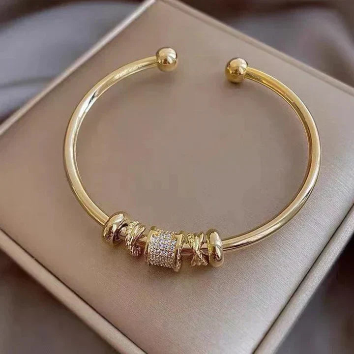 Chic Adjustable Bracelet Adorned with Elegant Gold Charms