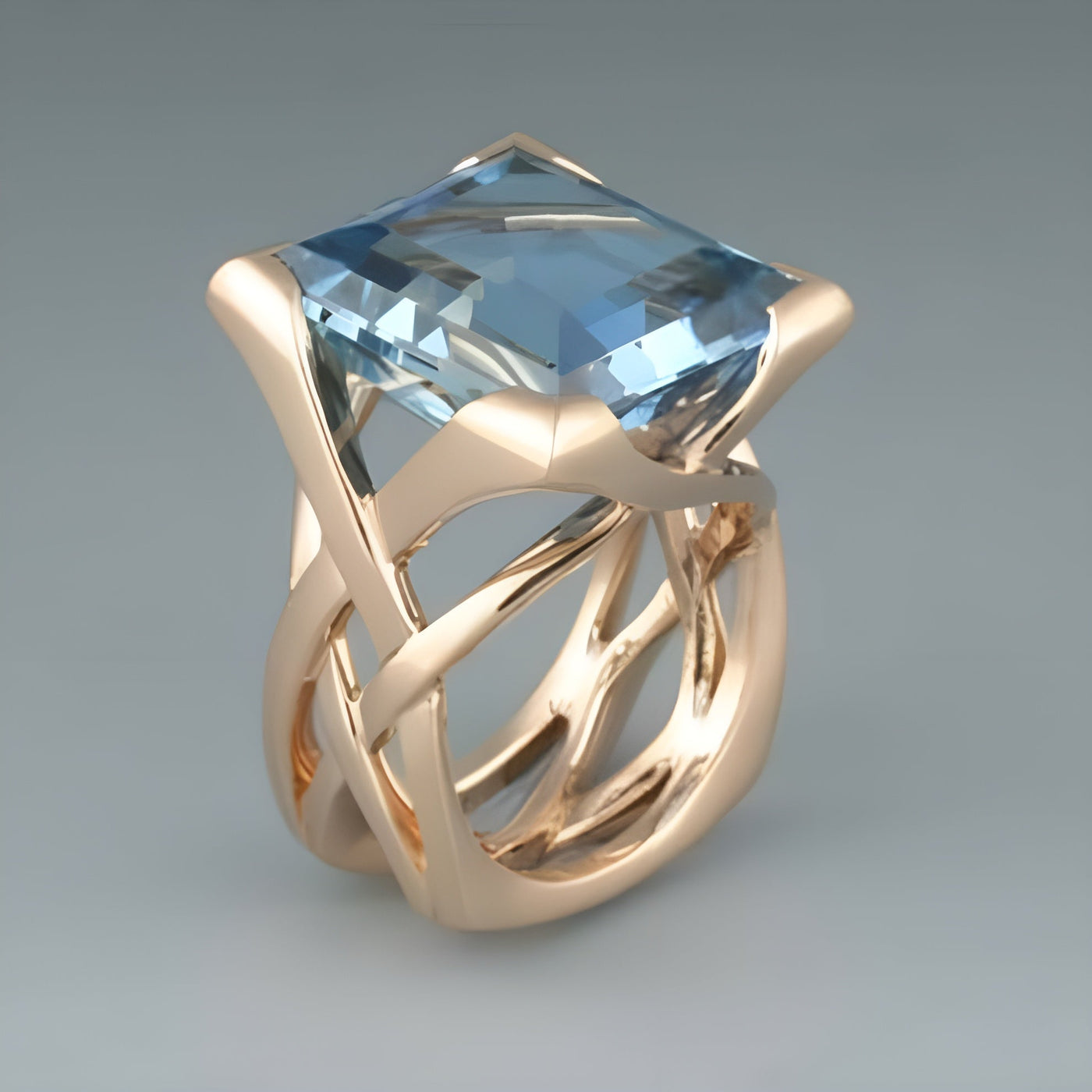 Vintage rose gold ring with blue zirconia.