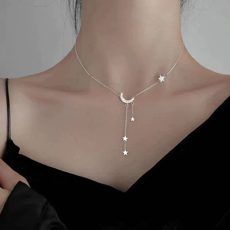 Chic Silver Necklace Featuring Moon and Star Design