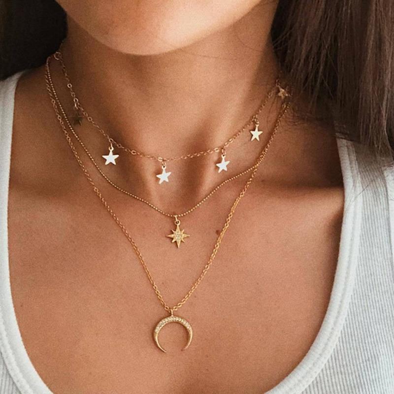 Elegant Gold Necklace Featuring a Delicate Moon Design