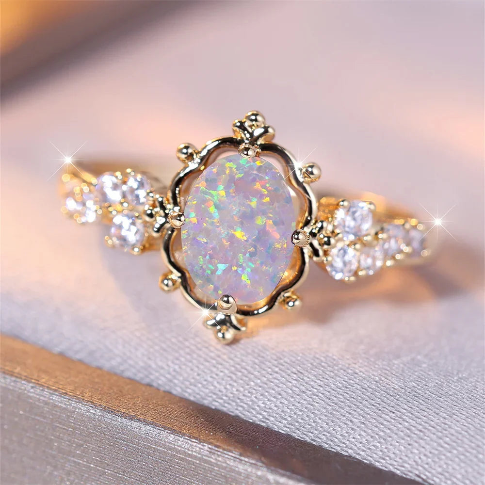 Celeste Vintage Gold Ring with White Fire Opal