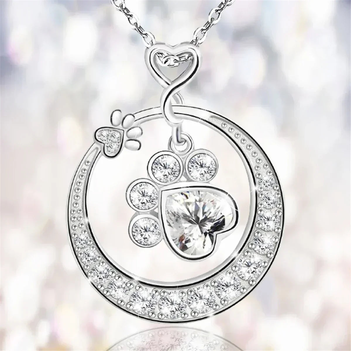 Seaton™ Silver Paw Necklace adorned with Zirconia