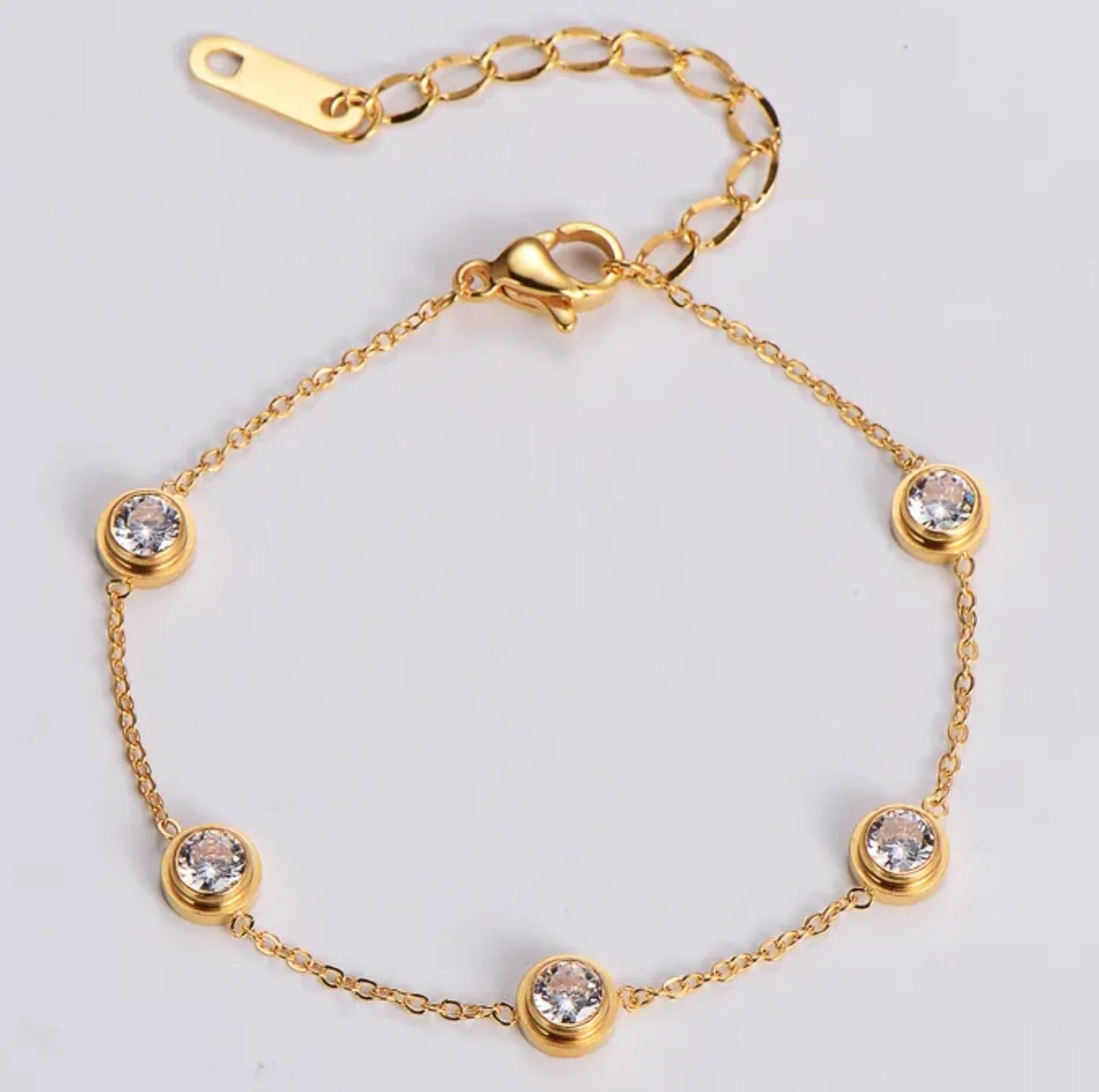 Gold Bracelet Adorned with Zirconia Stones
