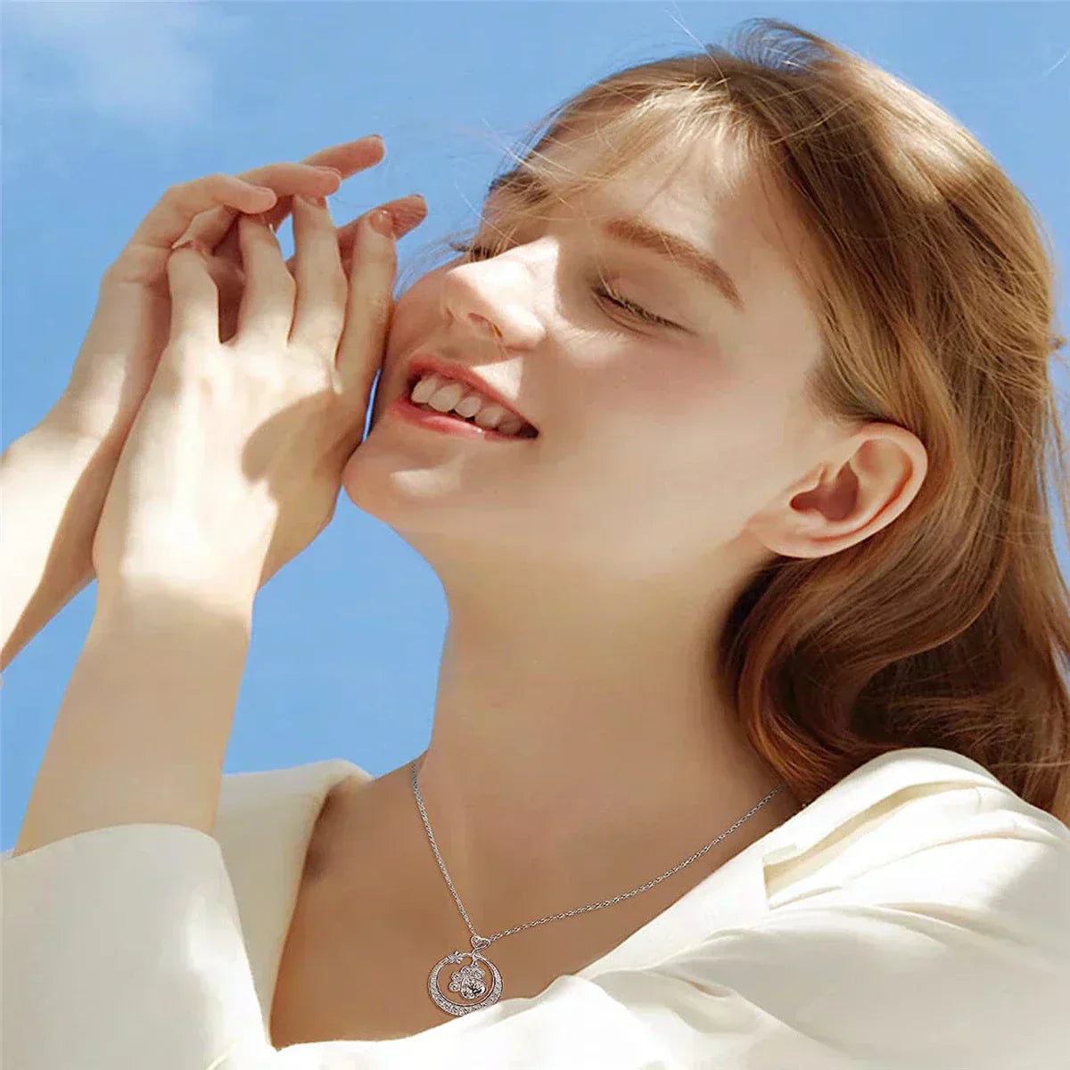 Seaton™ Silver Paw Necklace adorned with Zirconia