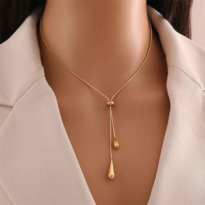 Versatile Lariat Necklace with Droplet Pendant and Coordinating Earrings