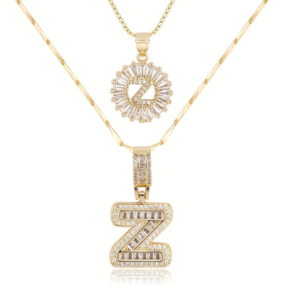 Pair of 14k Gold Initial Necklaces Adorned with Diamonds