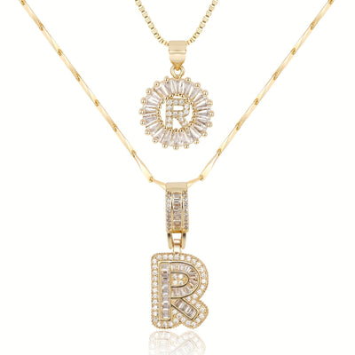 Pair of 14k Gold Initial Necklaces Adorned with Diamonds