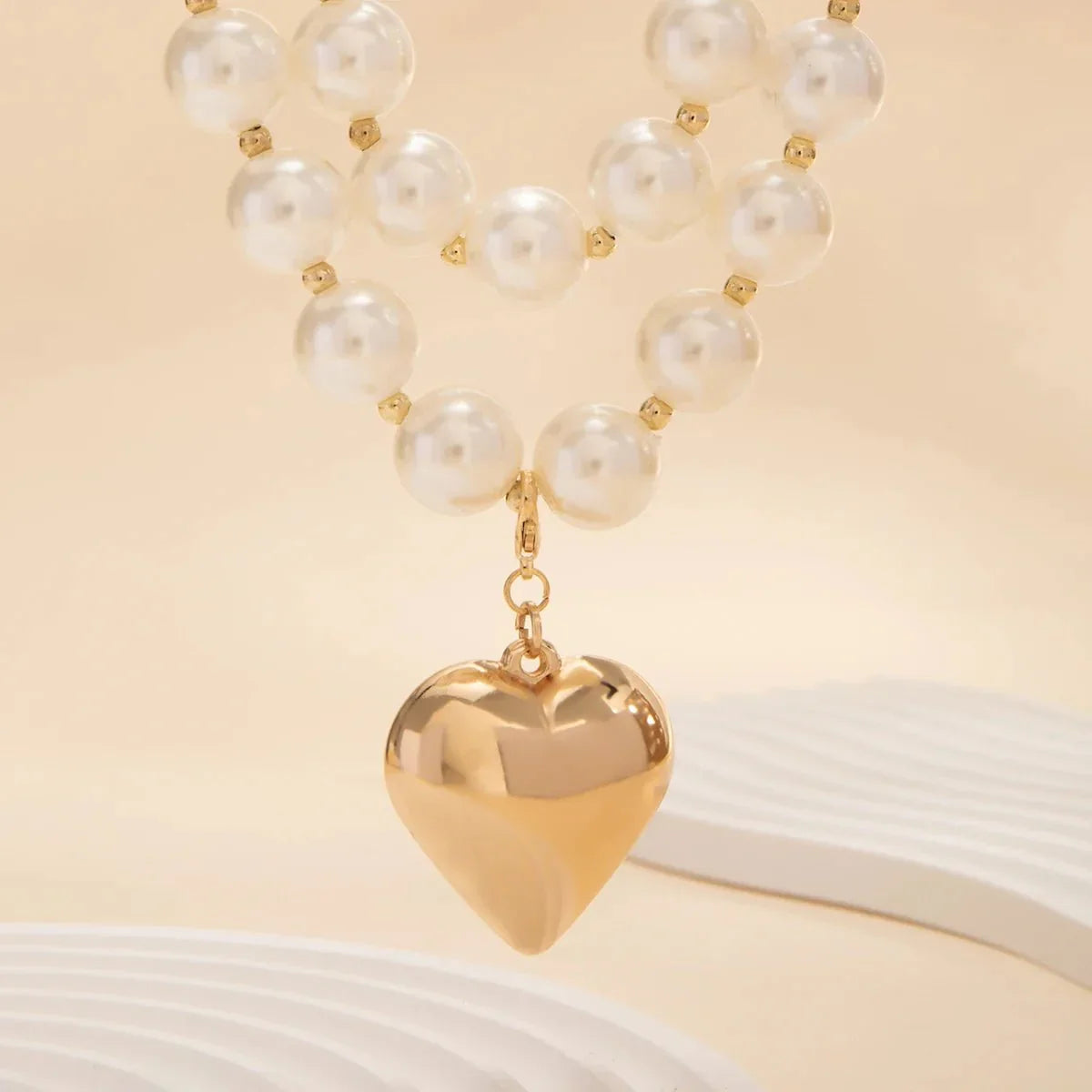Striking Layered Heart Necklace with Bold Pearl Accents