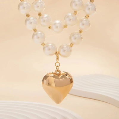Striking Layered Heart Necklace with Bold Pearl Accents
