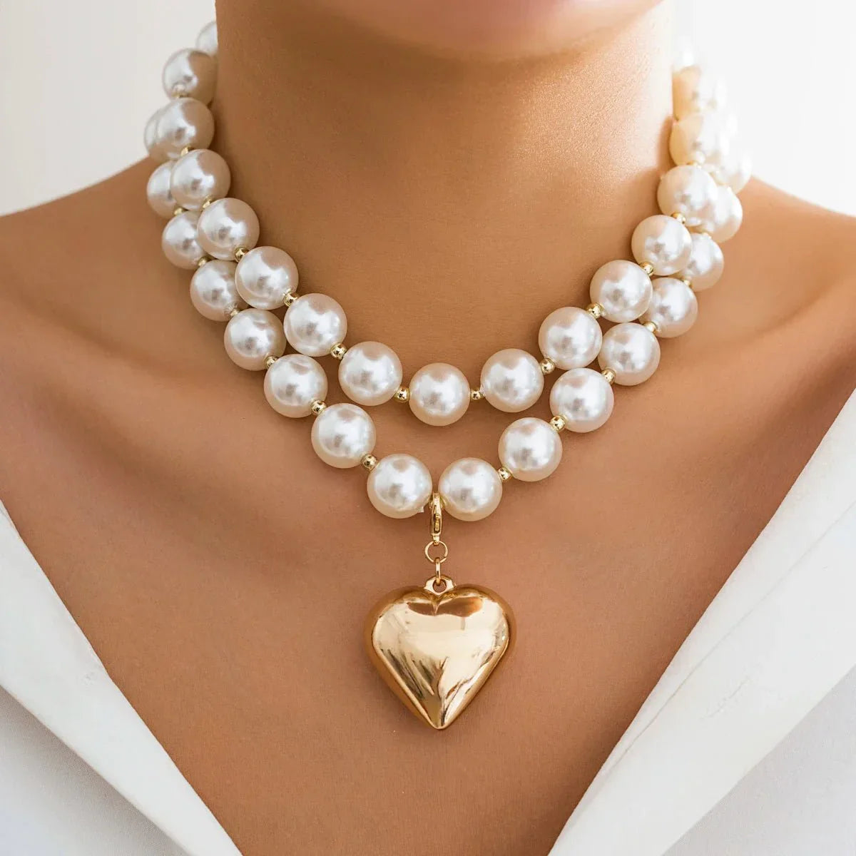 Striking Layered Heart Necklace with Bold Pearl Accents
