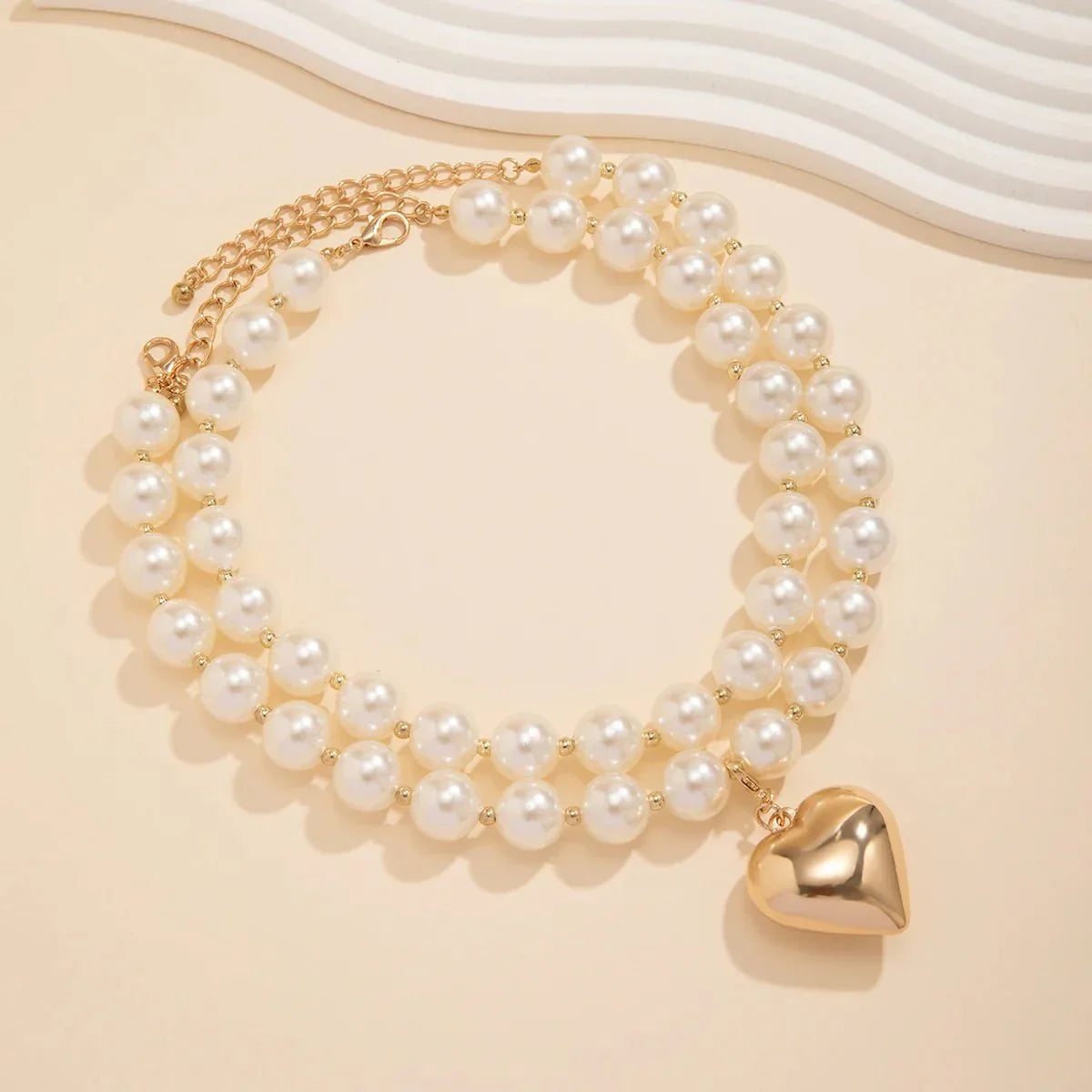 Striking Layered Heart Necklace with Bold Pearl Accents