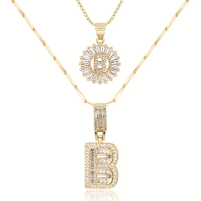 Pair of 14k Gold Initial Necklaces Adorned with Diamonds