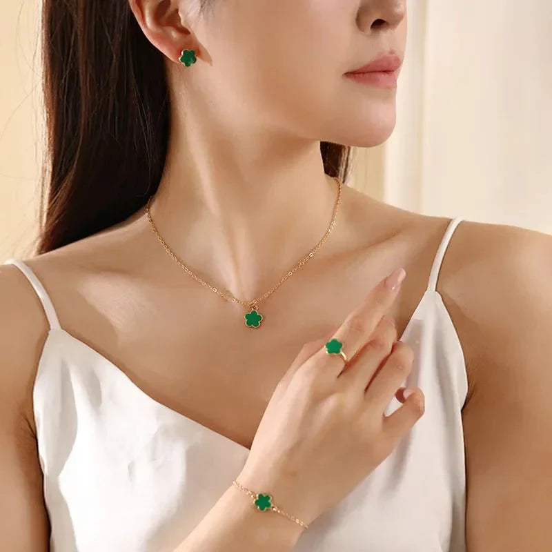 Elegant Floral Clover Jewelry Collection: Necklace, Bracelet, Earrings, and Rings