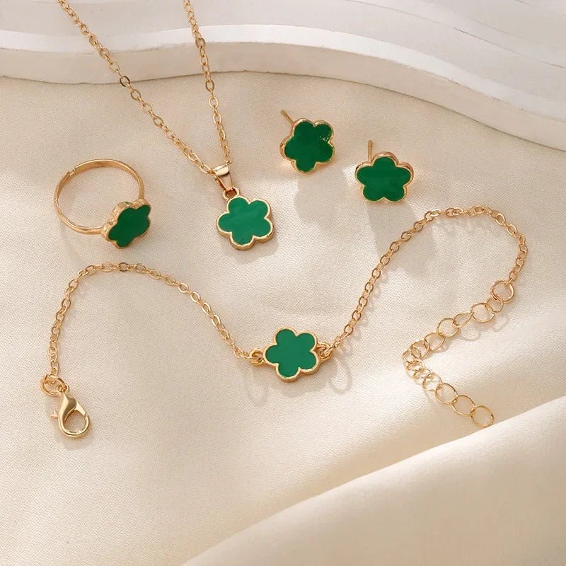 Elegant Floral Clover Jewelry Collection: Necklace, Bracelet, Earrings, and Rings