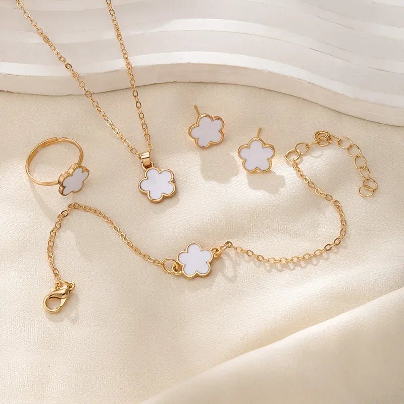 Elegant Floral Clover Jewelry Collection: Necklace, Bracelet, Earrings, and Rings