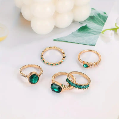 Zarina Elegant Emerald and Gold Ring Collection