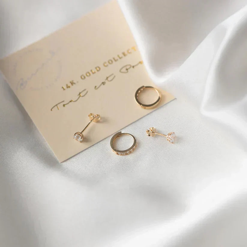 Larmes™ | Gold Stone Stud Earrings" can be rewritten as "Larmes™ | Elegant Gold Stone Stud Earrings.