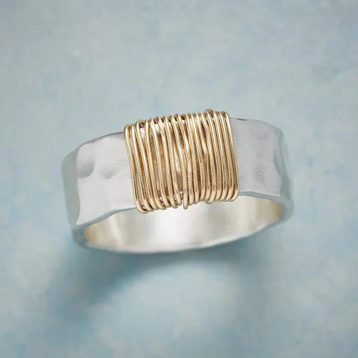 Vintage silver ring with gold filament.