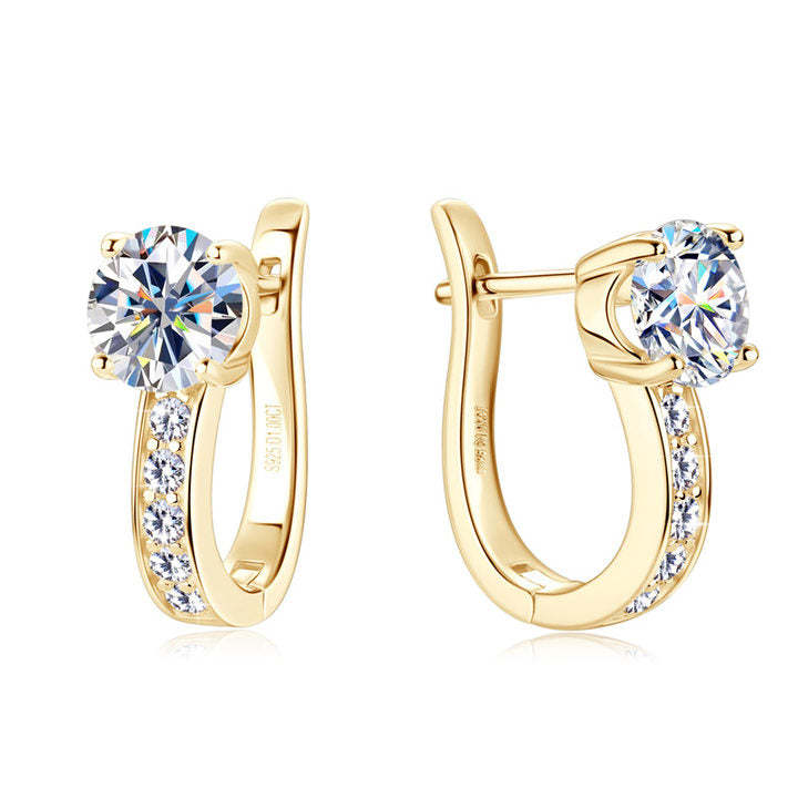 Channel™ | Gold Moissanite Huggie Earrings" can be rewritten as:

"Channel™ | Huggie Earrings with Gold Moissanite