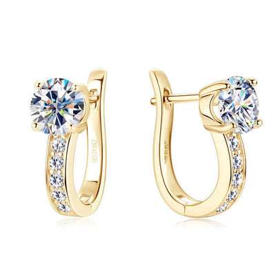 Channel™ | Gold Moissanite Huggie Earrings" can be rewritten as:

"Channel™ | Huggie Earrings with Gold Moissanite