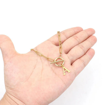 Circle Lock Clasp Necklace Featuring Paperclip Initial Charm