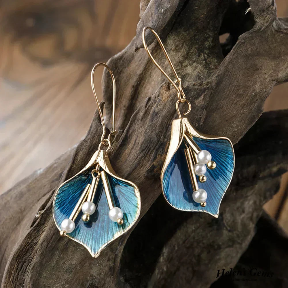 Chic Silver Earrings with Elegant Blue Lotus Design